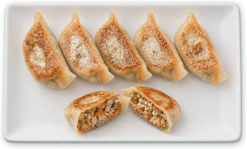 Gyoza porc légumes · 6 pièces : 6 raviolis grillés vapeur · porc, légumes, gingembre